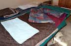 Now the bed is ready, clean sheet, duvet, cussion, extra blanket for the winter and a towel, now i close it up and roll it up.