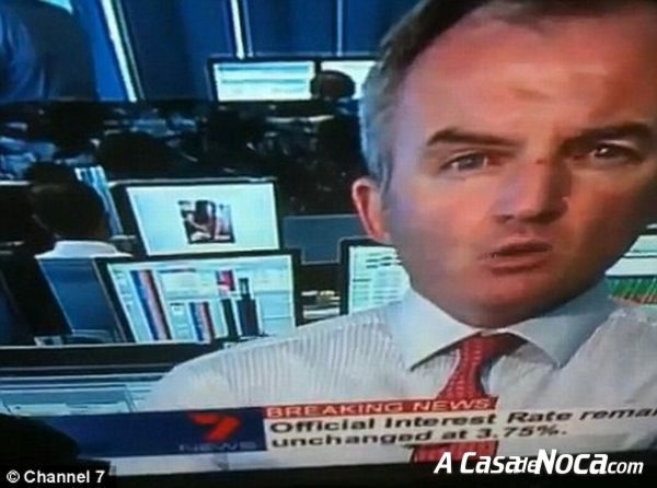 [banker_busted_on_tv_news_01[4].jpg]