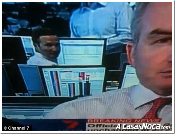 banker_busted_on_tv_news_03