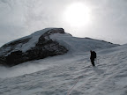 A fresh dump of snow coating the trail (in August!)... sun starting to break through.