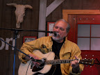 Jorma Kaukonen plays a song at the student performance.