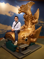 Not a fish, I think its a shachi, a mythical dolphin like creature that wards off fire.