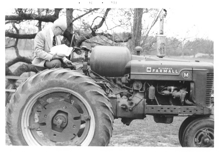 Dad arriving home on the tractor with fried chicken