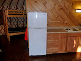 It comes with a fridge/freezer and range