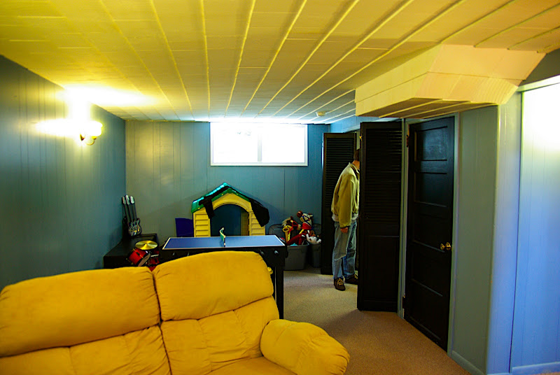Other side of rec room - the black folding doors hide the laundry.  Maybe theres some creative way we could get the laundry on the second floor, but I doubt it...