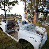 Our Line Producer, Marianna, exploring the remains of a car in Rozdolinsk