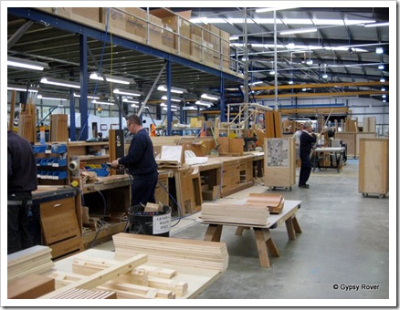 All parts are cut out by a computer driven machine ready for assembly. Curved doors are ply that is steamed into shape.