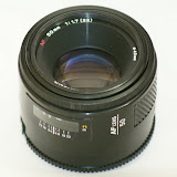 The front of the lens. The glass is clear but the body shows the age