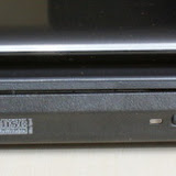 The right side has a USB port, the DVD Writer and the power slot