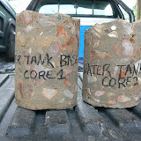 A pair of concrete cores as drilled out of a foundation.