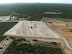 Left to right: construction camp, mine infrastructure area, plant area and borrow-pit to the rear.