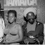 -Photo Credit: Ajamu
Duane Stephenson, Etana, Cocoa Tea, and TJB Memeber Laverne Mattie at the
'Team Jamaica on the Road to Beijing' Reggae Charity Concert. Team Jamaica is
off to a Roots rocking start on the road to the annual Penn Relays in Philadelphia
this weekend, thanks to Reggae legend Cocoa Tea and his musical brethren who
rocked Brooklyn College’s Walt Whitman Theater last Sunday for the ‘Team
Jamaica on the Road to Beijing’ Reggae Charity Concert. Presented by Team
Jamaica Bickle and VP Records, scores of Reggae fans were treated to the drum
and bass sounds of the island, while raising much needed capital to fund
Jamaica’s track and field athletes at Penn, and on their journey to dominate the
XXIX Summer Olympic Games in Beijing, China this August.