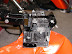Right side, battery in place, showing holes for fuse box next to coupling nuts for ignition switch. MSS