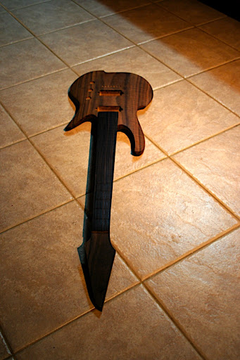 There's a light coat of tung oil on the body and a tiny bit of lemon oil on the neck and fretboard just to bring out the colour.