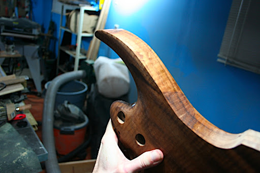The lines of the back will follow the contours of the top when the top is carved. It will be flowing and organic, with a clear line separating the top from the back.