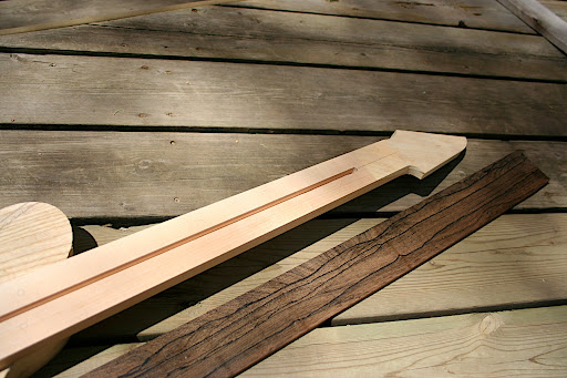 The neck has a piece of swamp ash grafted on at the scarf joint for the headstock.