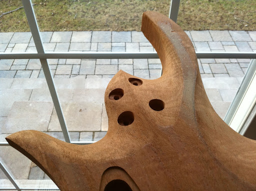 Sanding will smooth things out and blend some of the edges and curves together in a more organic way.