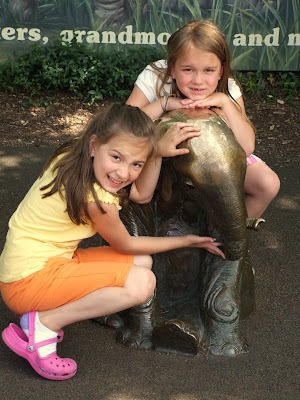 my big girls, disappointed about not seeing the baby elephant, but making the best of it