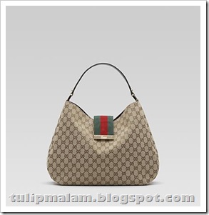 large hobo with engraved gucci script logo