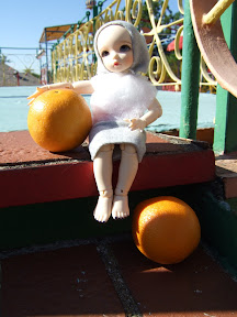 Genevieve and a couple of oranges Genevieve and a couple of oranges