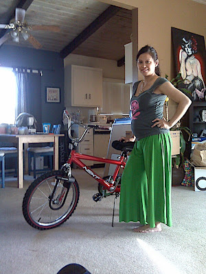 Preggo and her little boy bike!