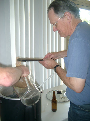 Dad takes the grain out of our wort for sparging.  Im not making these words up.