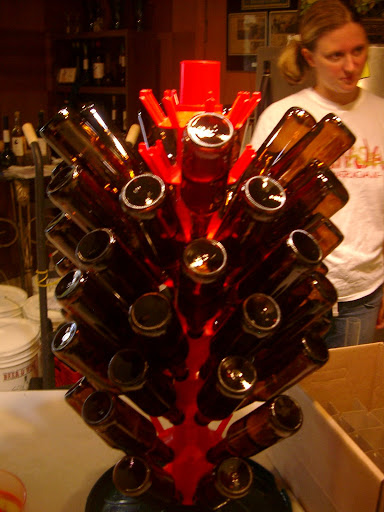 Sanitized bottles wait on the tree while I get my instructions