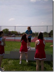 Alexis receiving her award at Special Olympics.
