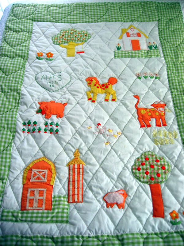 The embroidered and appliqued quilt my mom made for the nursery, 1977-1985