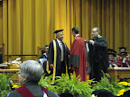 Me getting hooded at Convocation