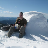 Bryce summit Eagle Peak... That is the cairn behind him in the snow