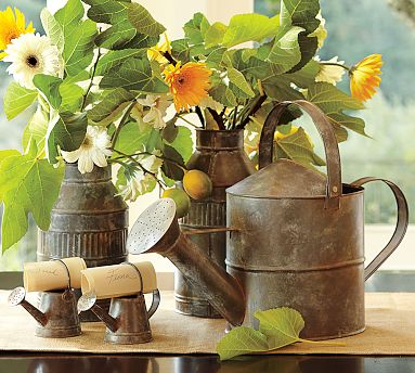 Watering cans as centerpieces