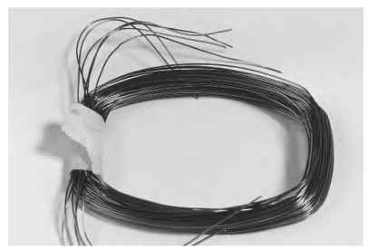 Typical wound coil ready for insertion. Typical wound coil ready for insertion.