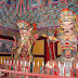 Guinsa 2899-07 Sacheonwangmun.JPG, Two of the Four Heavenly Kings, each of whom watches over one cardinal direction of the world, inside Guinsa's second Gate. On the left is is the king guarding the East, "Dhrtarāstra" meaning "He who maintains the state" or “Watcher of the Lands”. On the right is the king guarding the South, "Virūḍhaka" meaning “He who enlarges” or “Patron of Growth”. The Kings signify protection to all devotees who enter the temple., South Korea - Guinsa (Buddhist Temple)