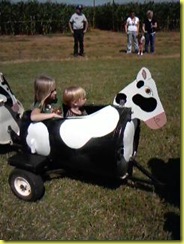 big sis and wiggles cow train