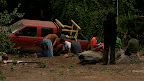 Ever-friendly Chileans helping the Alzar School retrieve their vehicle from a sand pit.