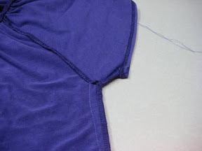 Sew new strap to front