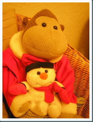 Monkey with snowman Monkey with snowman