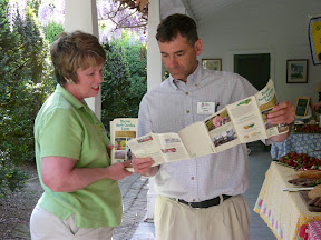 Two people looking at agritourism maps during workshop