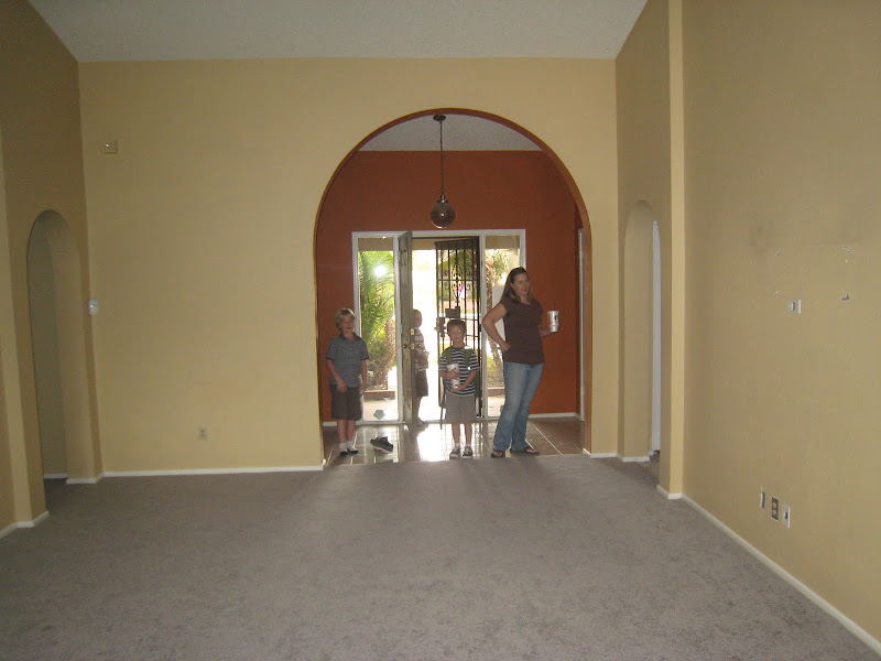 Sara and the boys entering our home of many colors