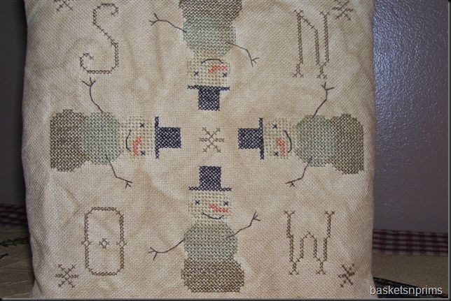 closeup of dirty snowman pillow