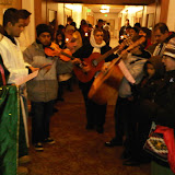 G.U. procession sings Christmas carols/villancicos de navidad.