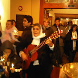 The G.U. procession enters the third house, the University Chapel.