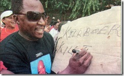 [KillBoerKillFarmer_ANCSloganMeansKillAllWhites University Free State SASCO supporter[4].jpg]