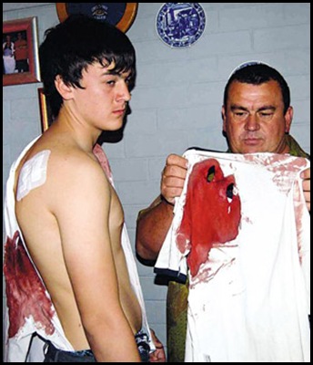 Kruger Jeandre and dad Johan friendly greeting between friends gets him stabbed Sept 21 2009 Beeld