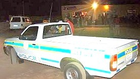 [Police vehicle parked outside shebeen _township pub Beeld Chris Louw De Wildt journalist[15].jpg]