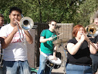 Photo: Darren, Patrick, and Katie play some music for the crowd.