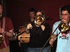 Photo: The Kingpin Brass Band trombones take the lead.