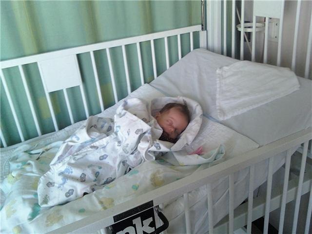 [Ella in hospital bed[2].jpg]
