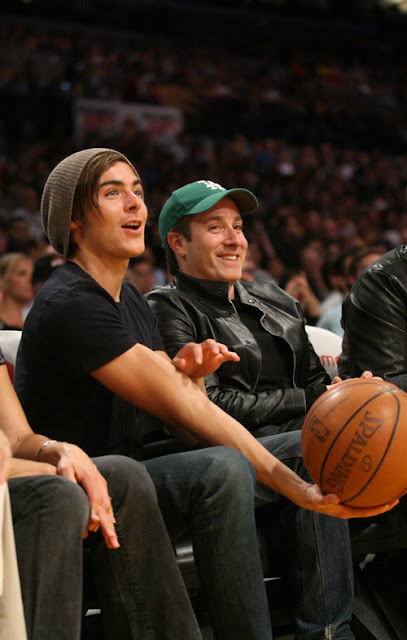 Zac Efron having a good time at the LA Lakers game. The Los Angeles Lakers defeated the Memphis Grizzlies by the final score of 99-89 at Staples Center in downtown Los Angeles, CA. <P> Pictured: Zac Efron <P> <B>Ref: SPL84529 030309 </B><br> Picture by: Kevin Reece / London Ent / Splash News </P><P> <B>Splash News and Pictures</B><br> Los Angeles: 310-821-2666<br> New York: 212-619-2666<br> London: 870-934-2666<br> photodesk@splashnews.com<br> </P>